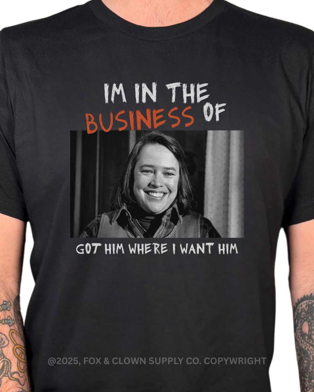 fox and clown funny punk shirt that says I'm in the business of misery got him where I want him with a picture of Kathy Bates from the movie Misery