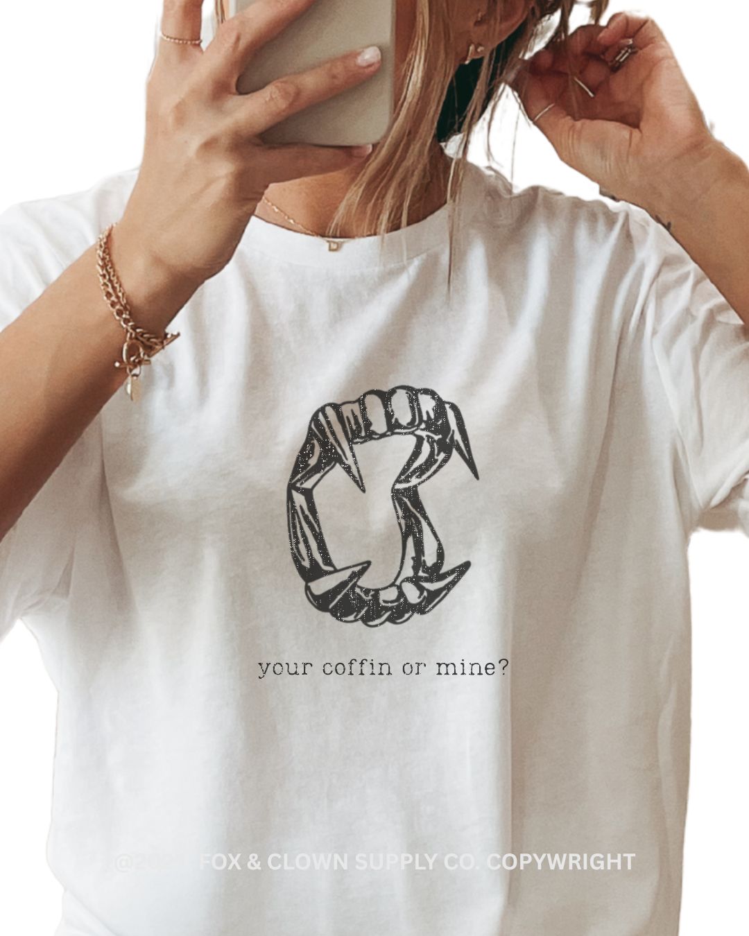funny punk shirt with your coffin or mine? written on it featuring vampire teeth