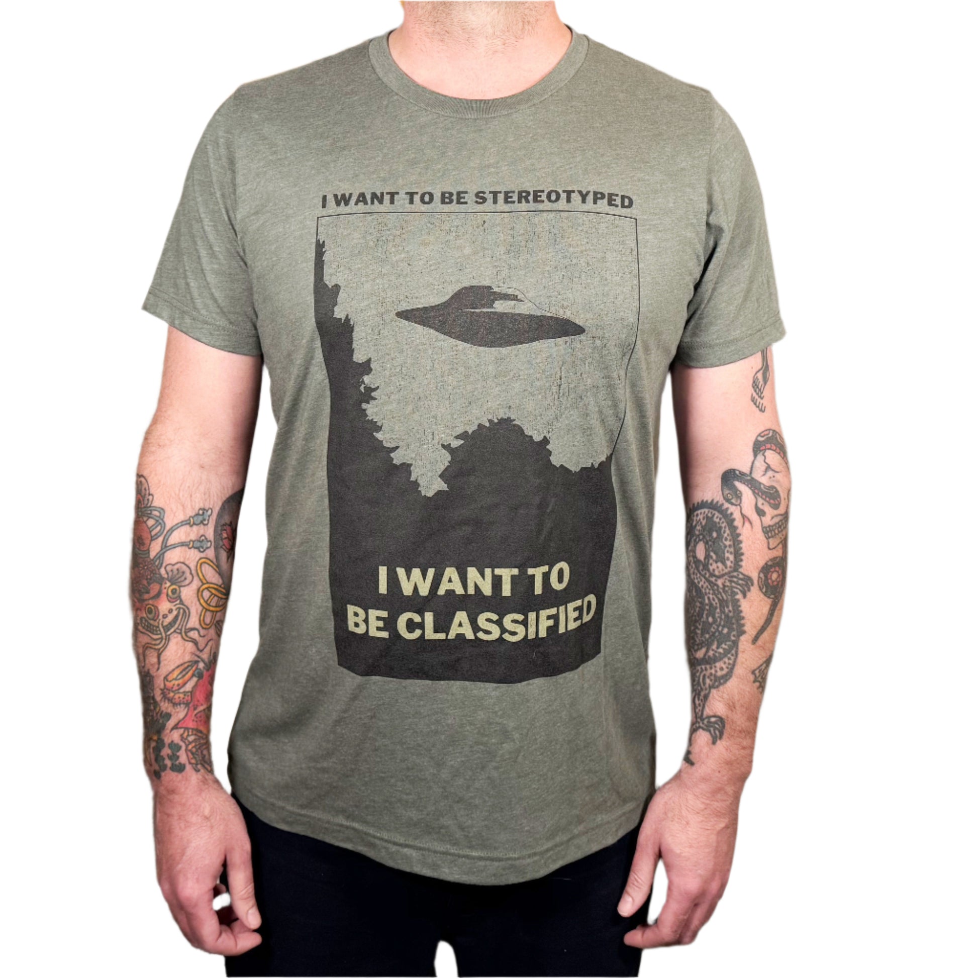 funny punk shirt featuring the lyrics I want to be stereotyped I want to be classified from the descendents song suburban home with an image of the I want to believe poster from fox mulder's office in the x-files